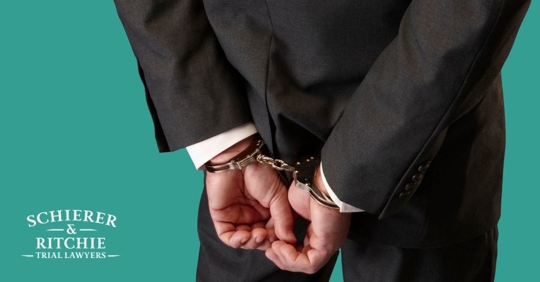 businessman on handcuffs